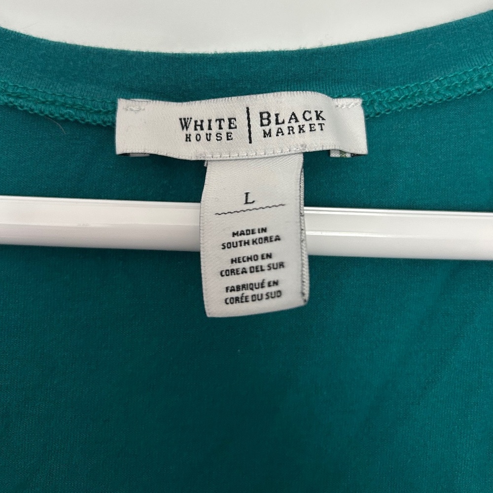 White House Black Market cowl neck sleeveless shirt.